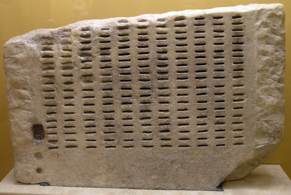 https://en.wikipedia.org/wiki/Kleroterion#/media/File:AGMA_Kleroterion.jpg